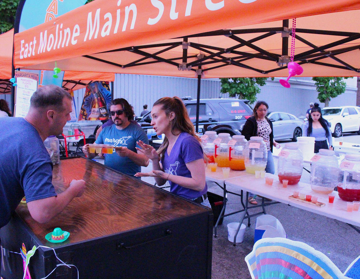 Man talking to drink vendor